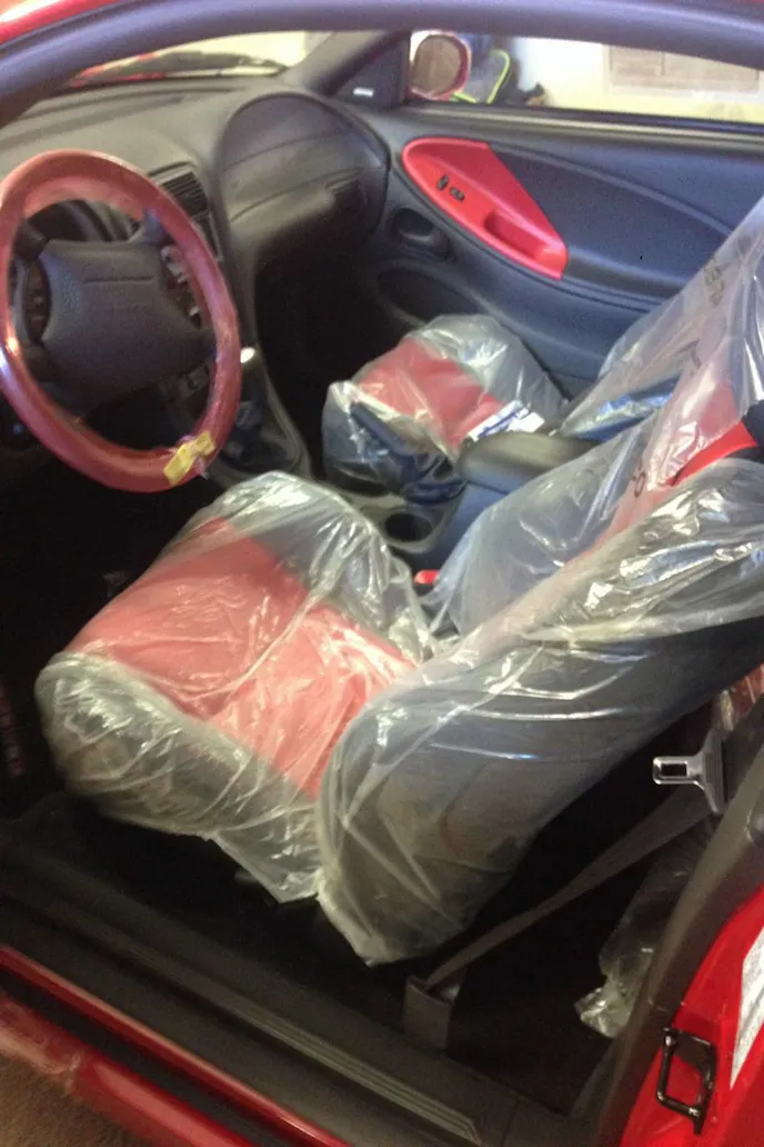 One aspect that differentiates the 10th Anniversary from normal Cobras is the red inserts in the seats and door panels. Of course, this one still has the plastic on the seats.