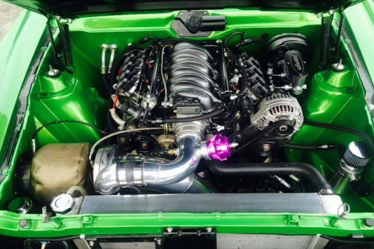 AMC fans turn away, that's definitely not a 304, 360, or a 390. That's an LS engine with a single BorgWarner turbo off to the side. The car is capable of high-9s, but it also has power steering thanks to an LS Simple front accessory drive. It also has Wilwood power disc brakes at each corner, as well. 