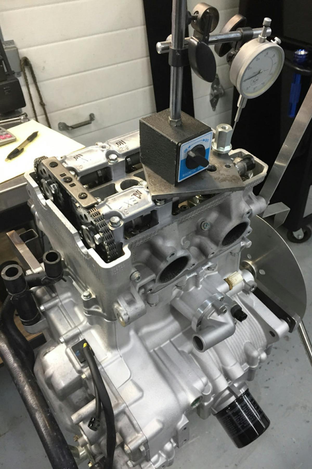 Setting the camshaft timing is performed much like any other multi-valve overhead-cam cylinder head.