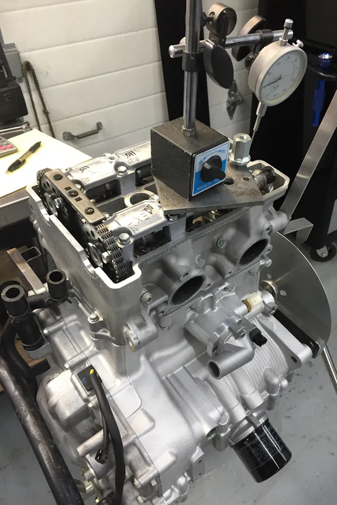 Setting the camshaft timing is performed much like any other multi-valve overhead-cam cylinder head.