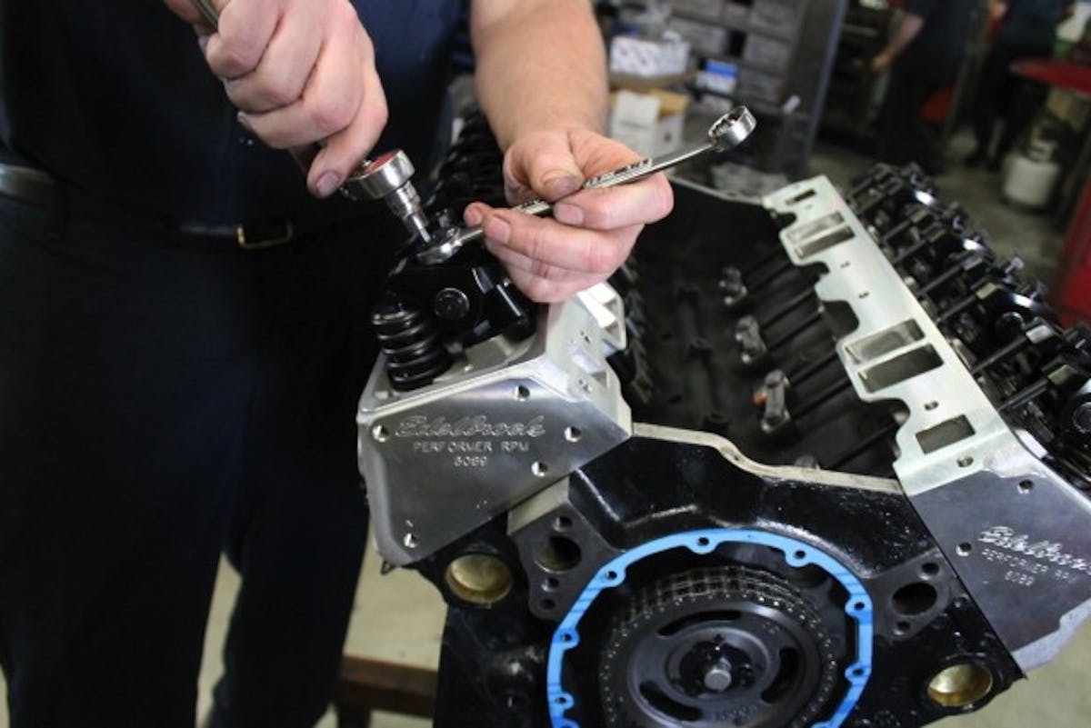 With the heads installed, we were then able to install the lifters, pushrods, and rocker arms.