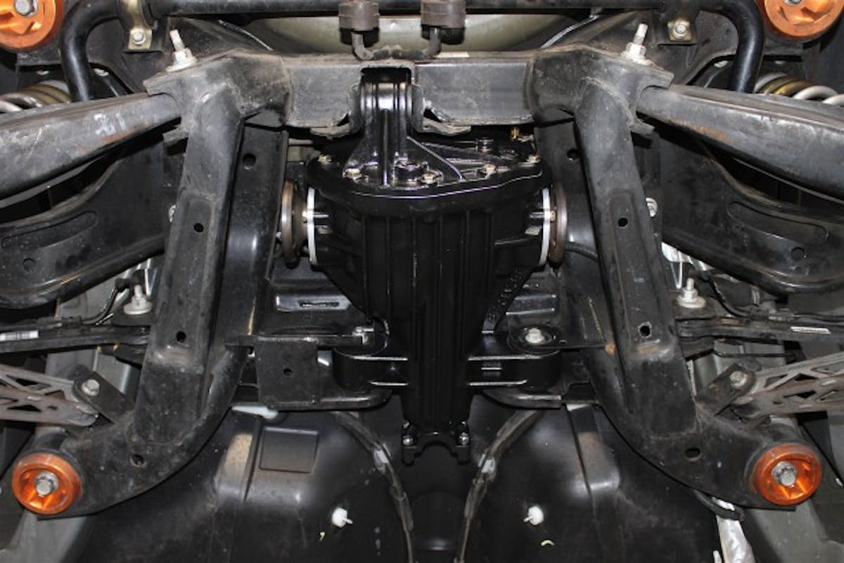 While the Strange differential is a direct fit in the Camaro's rear suspension cradle, it will require an aftermarket driveshaft and half-shafts. We went with both from the Driveshaft Shop on our Camaro, matching them to the torque capacity of the new differential unit.