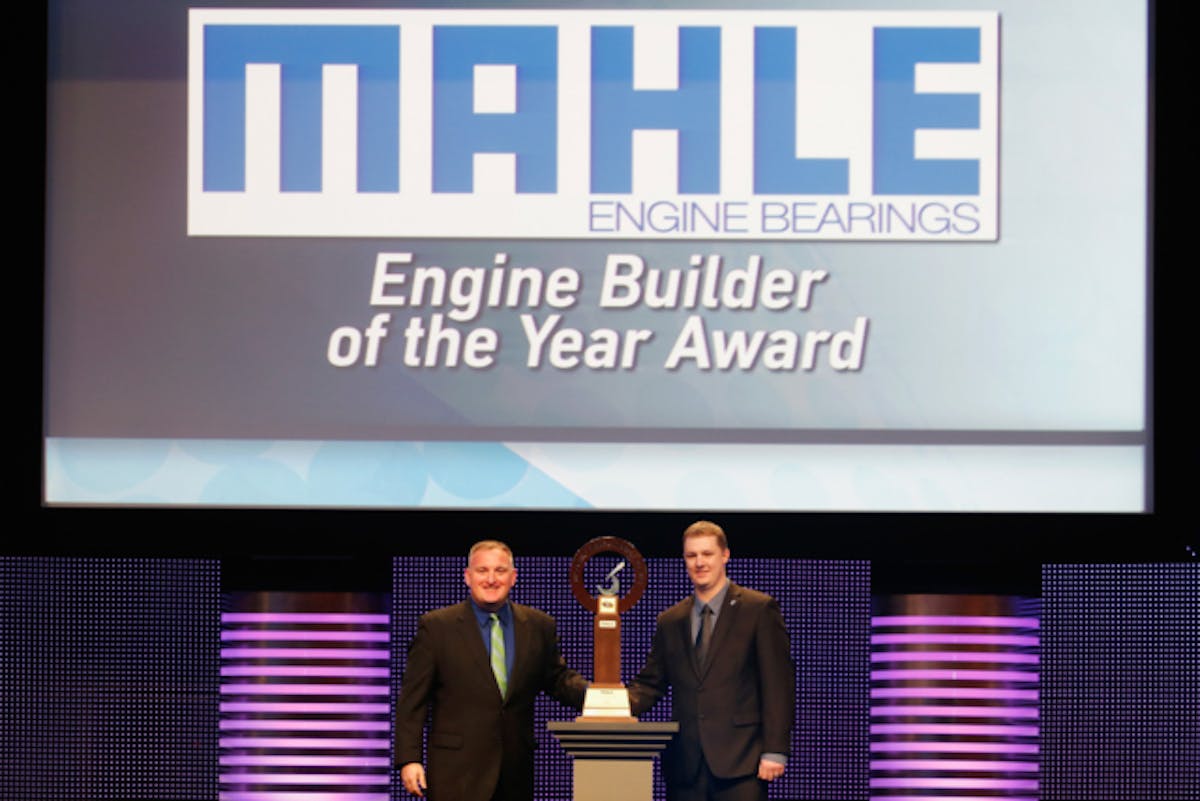 Director of Marketing at MAHLE Aftermarket Inc. Ted Hughes (L) presents Sam Vernatter of Hendrick Engines with the 2015 MAHLE Engine Builder of the Year Award during the 2015 NASCAR NMPA Myers Brothers Awards Luncheon at Encore Las Vegas on December 3, 2015 in Las Vegas, Nevada.  (Photo by Brian Lawdermilk/NASCAR via Getty Images)