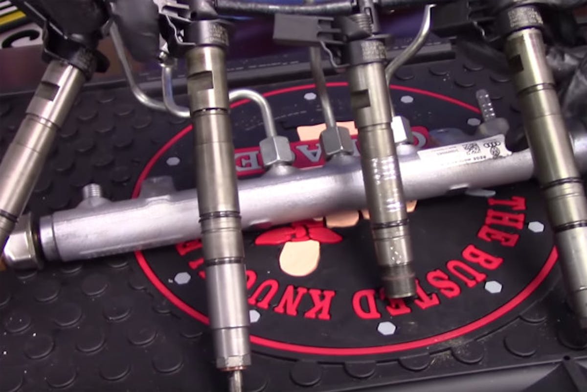 A closeup of the fuel injectors in a VW diesel fuel system.