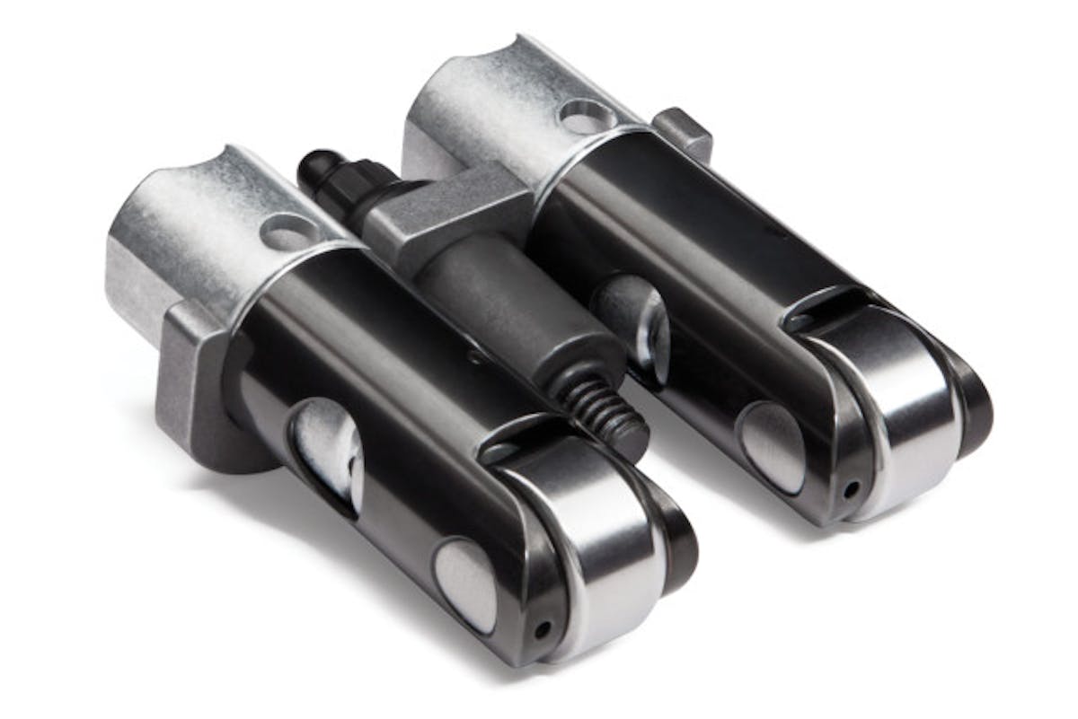 Jesel Valvetrain Innovation has a series of lifter types that suit a variety of performance levels. This is the Jesel Dogbone lifter. Dogbone Lifters derives their name from the dogbone-shaped steel retainer that bolts to the block and maintains lifter alignment. Jesel’s Dogbone Roller Lifter applications include: Chevy SB2.2, LS1, LS6, LS3, C5R, Chevy (Holden Block), A-4 Dodge Midget and Rodeck 481X. They are lighter than tie-bar style lifters and are an alternative to Keyway Lifters because they do not require special lifter bushings to be installed in the block. The Jesel Dogbone retainers can be easily installed with a simple drill jig available from Jesel. Standard features include an ultra-light design, pressurized roller oil circuits, hard-coated steel bodies, aluminum pistons, hardened-steel pushrod seats and internal axle locking pins.