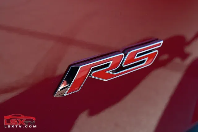 The RS package adds 20-inch wheels and tires, HID headlamps, LED tail lamps, RS-specific grilles, and a decklid trunk spoiler.