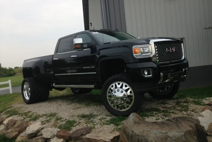 This 2015 GMC dually is one noteworthy piece of Carl's 4x4 handiwork. It has seven inches of lift, big wheels and tires, EFI tuning, and more to make it stand out.
