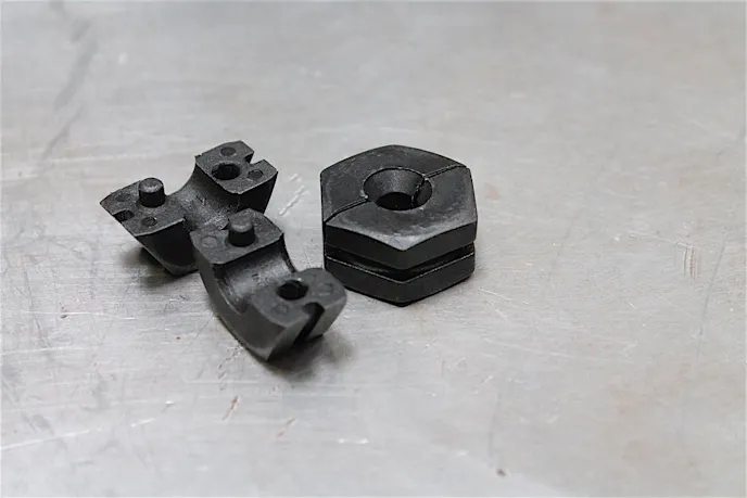 These collets lock the line into place while you're using the press to lap the flare into shape.