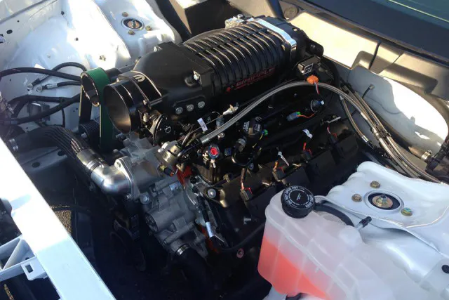 This supercharged 354 Hemi is a factory first for Mopar.