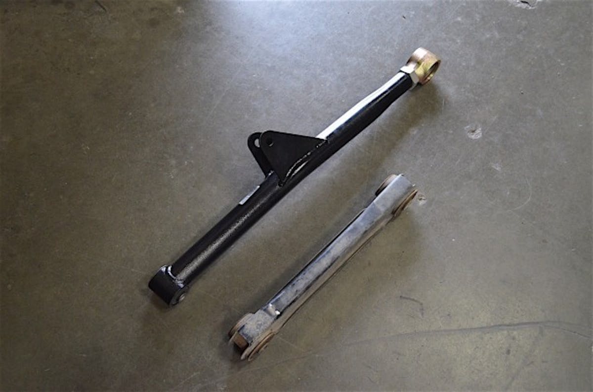 The new Y-arm setup compared to the factory arms.