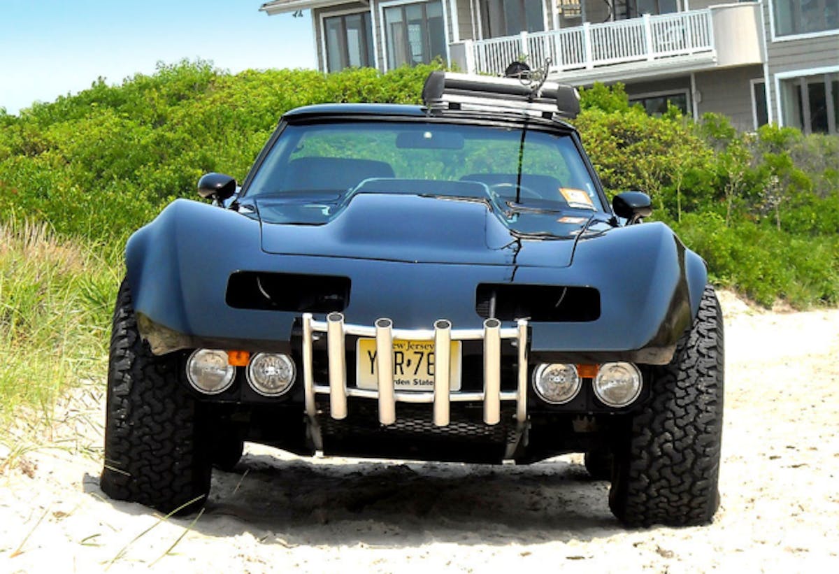 Imagine this black Vette on the white sand coming to bail you out of the sand!