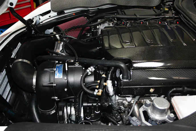 With the i-1 installed, all the stock bodywork back in place, and the touch-screen controller mounted inside the car, the physical part of the job was finally complete