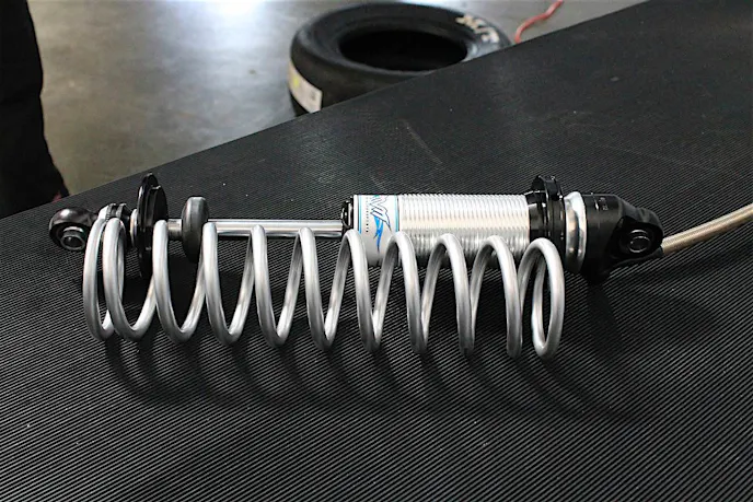 The Menscer Motorsports double-adjustable aluminum rear shocks with external canister provides adjustment for both rebound and compression.