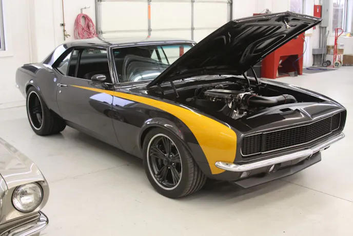 Musclecars like this 1968 Camaro are built similarly to hot rods in Pinkee's shop
