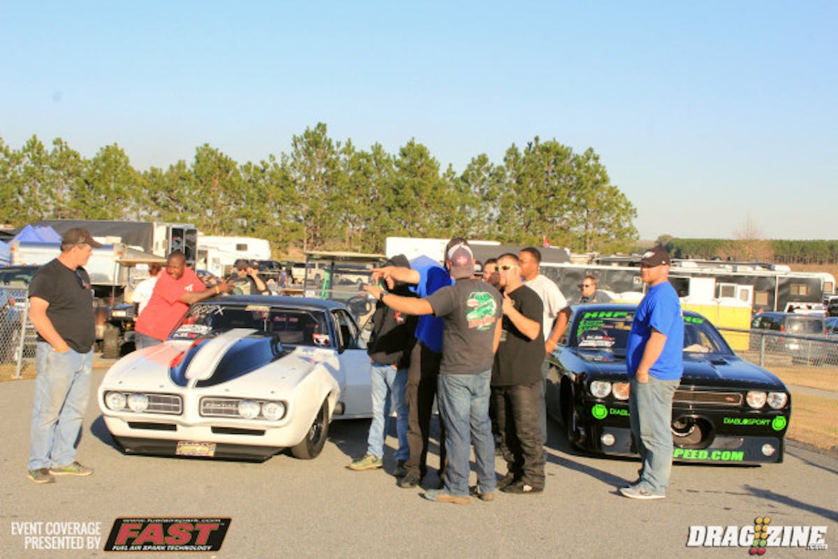 Rob Goss (pictured right next to Charlie Johnson) leads Precision Turbo/KBX  X275 after running a 4.396 at 164.53 MPH with his F1X Procharged 2009 Challenger. 