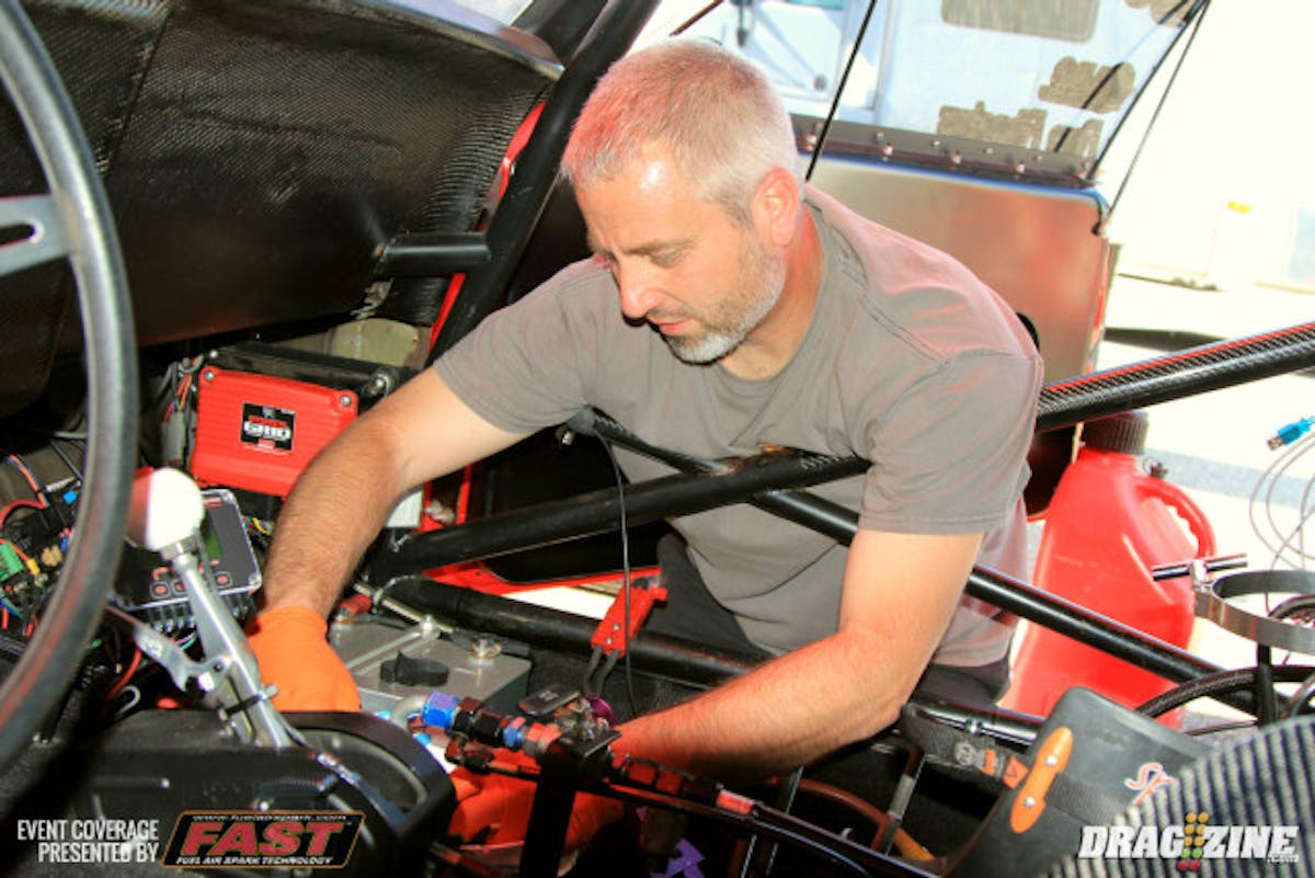 We caught up with Ron Rhodes in the pits changing the set up in the trans pressure dump valve. Rhodes matched his personal best 4.45 this weekend and the data shows they have room for improvement. Rhodes runs engines from BES topped with an Induction Solutions nitrous system back with a Hutch built power glide and PTC converter.