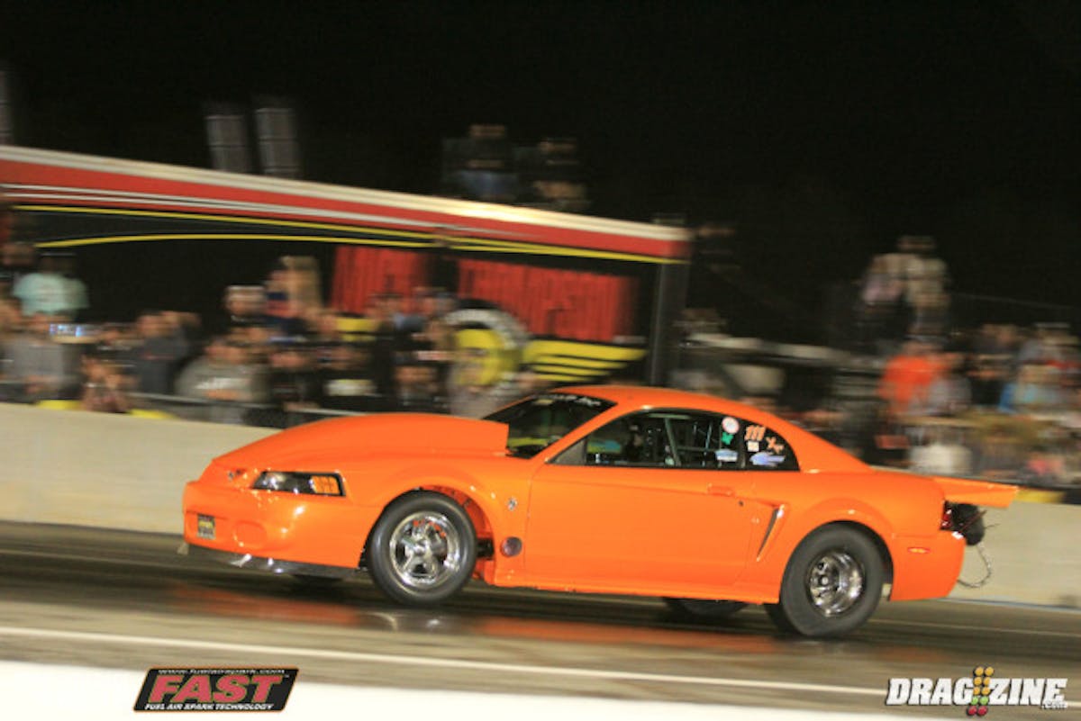 Mean Dean Marinis got caught late on the tree but had enough to drive around Dustin Mewborn running a 4.46 at 158 to Mewbourn's 4.58 at 158 in a classic nitrous vs turbo match in X275.