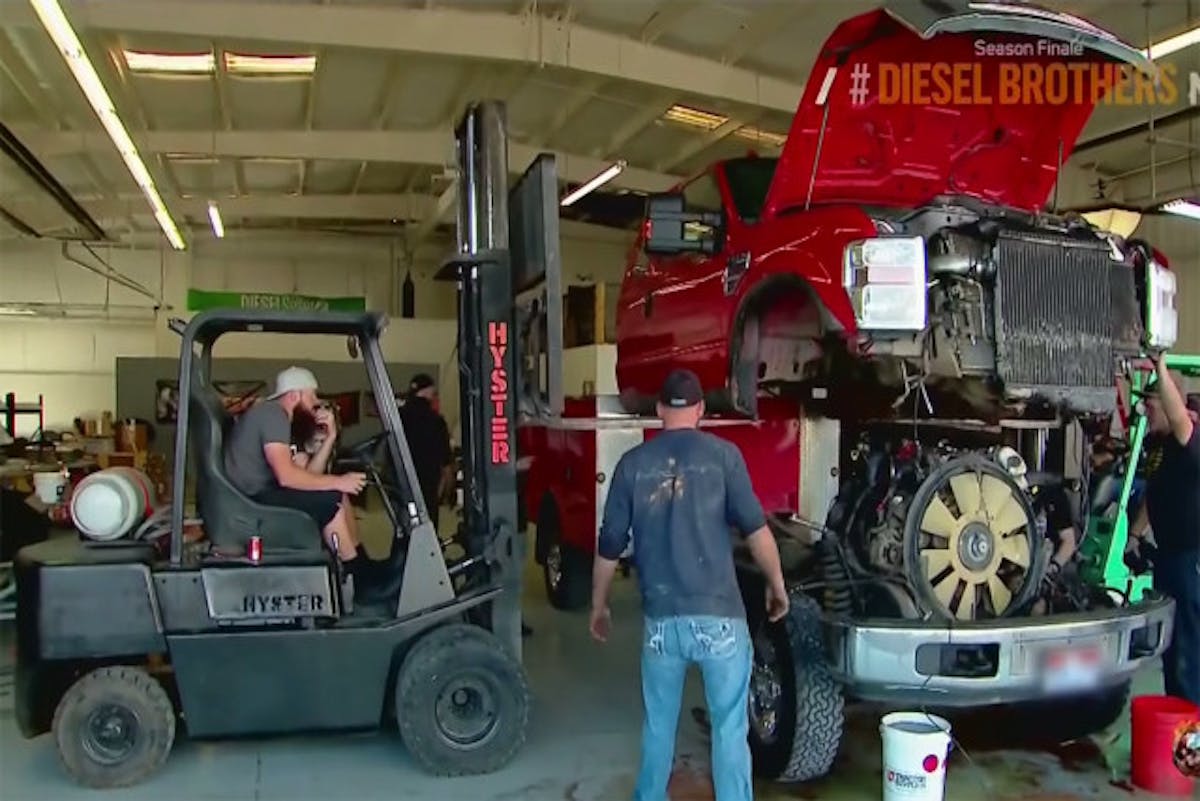 The donor F-250 has its motor pulled to power the F-550