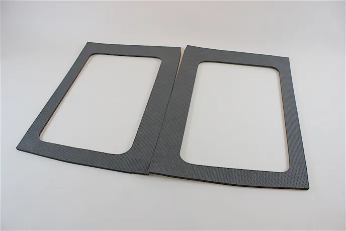 The side window kit surrounds the side windows of the Jeep hardtop, adding to the sound-dampening effects of the headliner kit.