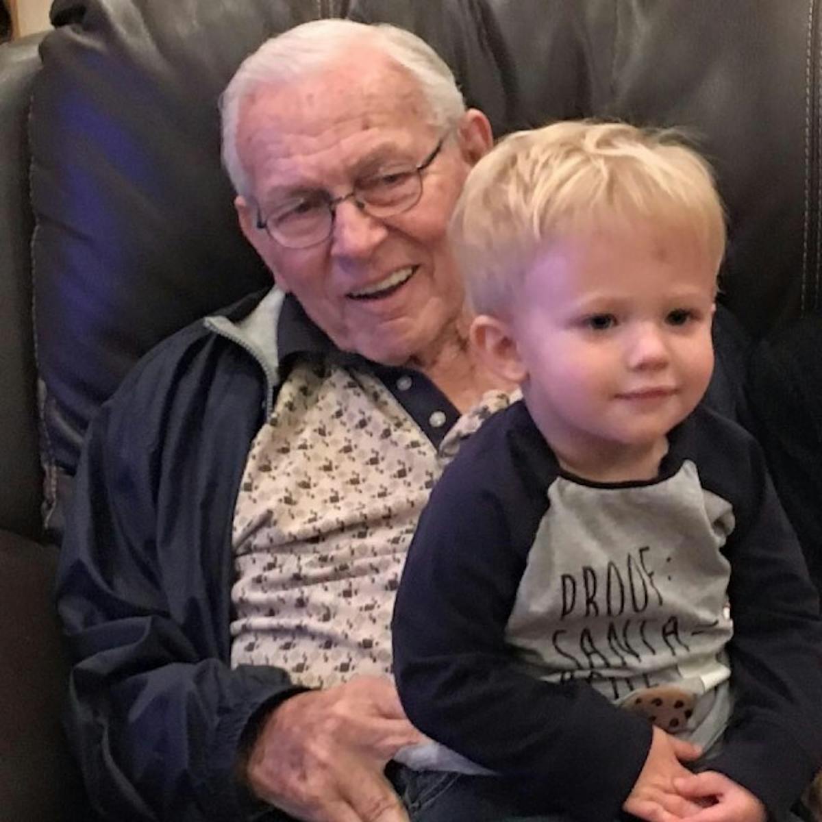 Frank Currie and one of his grandsons. Image Sourced: Casey Currie Facebook