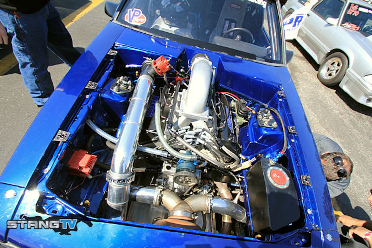 Manny Buginga is back at it after an eight year absence from the racing scene with this LX Mustang. He is running a 380 inch small Ford from Nelson Competition fed by a 94 MM Precision Turbo and backed by a Proformance Racing Transmission. Nick Bruder is tuning the Fuel Tech engine management software and the team had yet to make a pass when we caught up to them in the lanes earlier.