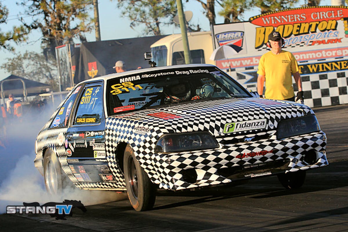 Longtime NMRA racer Carlos Sobrino sits seventh  in class with a 10.38 at 128.