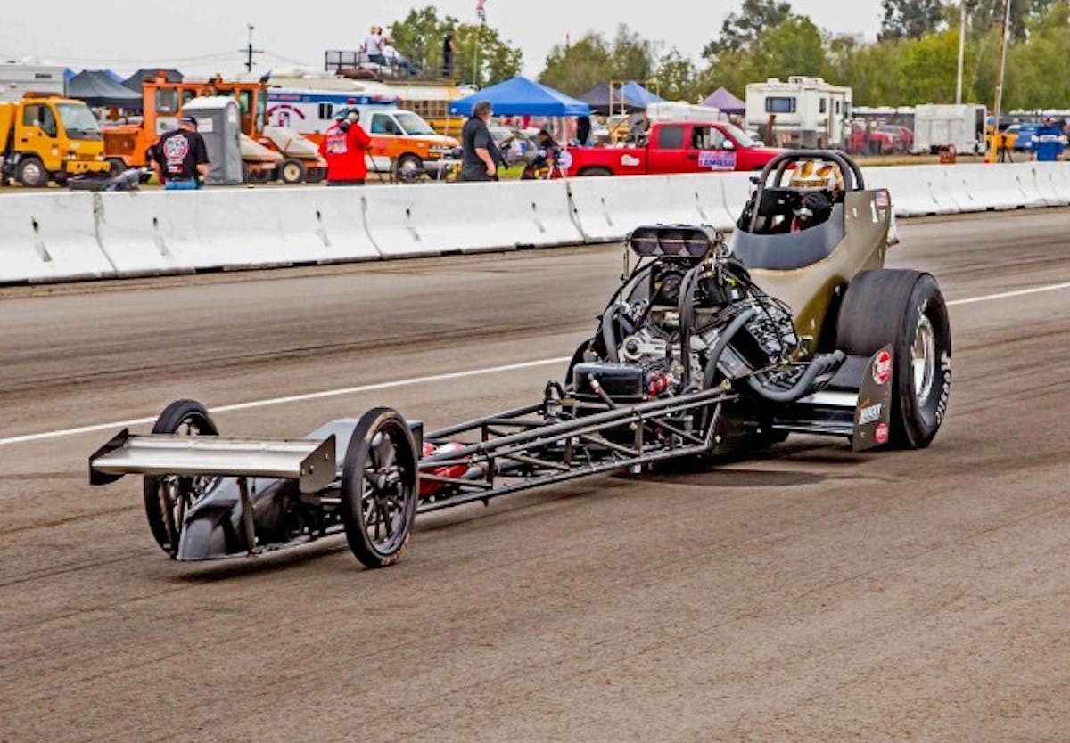 Top Fuel #1 Qualifier Tony Bartone 5.676 et @ 212.39 mph