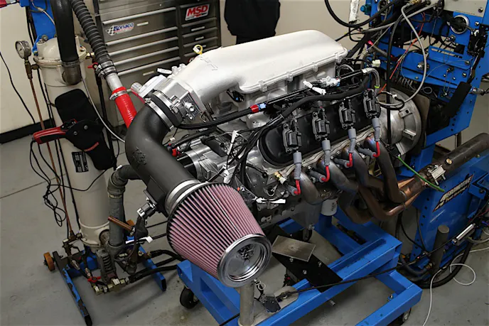 While not as tall as the Hi-Ram, the Holley Mid-Rise sits higher than stock. While it may fit under the stock hood in some applications, it's worth noting that it will take up additional vertical space versus the stock manifold.