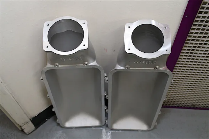 Since the only difference between the tops of the Holley Hi-Ram and the Mid-Rise is the throttle body port size, we decided to use the Hi-Ram's piece rather than the stock Mid-Rise. This allowed us to take full advantage of the 102mm throttle body we'd used for the LSXr and Hi-Ram pulls, rather than choking the throttle body by creating a bottleneck at the intake port with a mismatched combination.