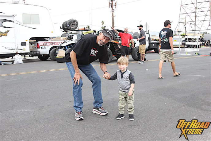 Larry poses for a shot with his grandson, Sawyer.