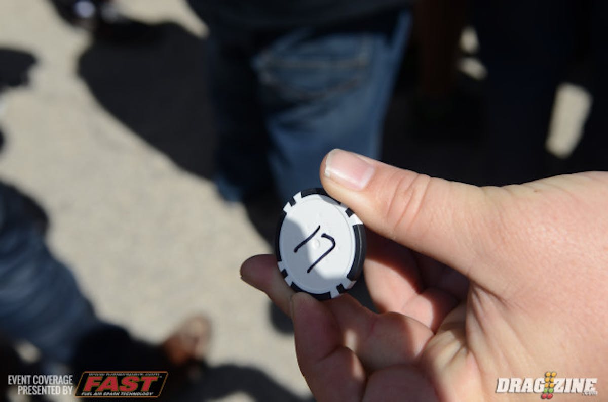 This is how the pairings are draw each round, with poker chips sporting a number and a lane. The two drivers with the same chip number face off.