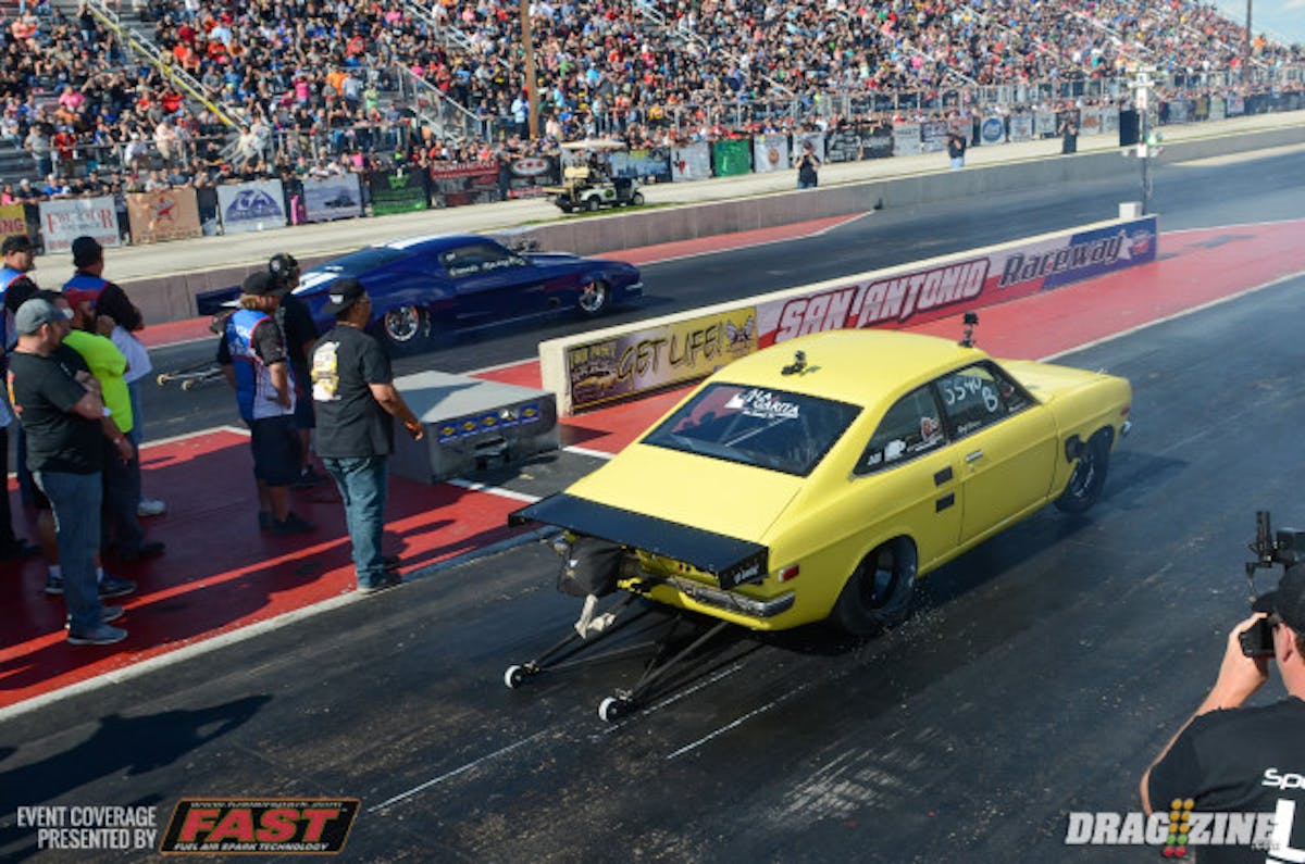 The Granado Brothers 'Blue Angel' Mustang and Brian Rodrigruez in the Got Jaunchy rotary-powered '72 Datsun brought the crowd to their feet with a staging duel that went on for more than a minute. Rodriguez finally went in, followed by the Blue Angel. Rodriguez was late off the line and never caught up.