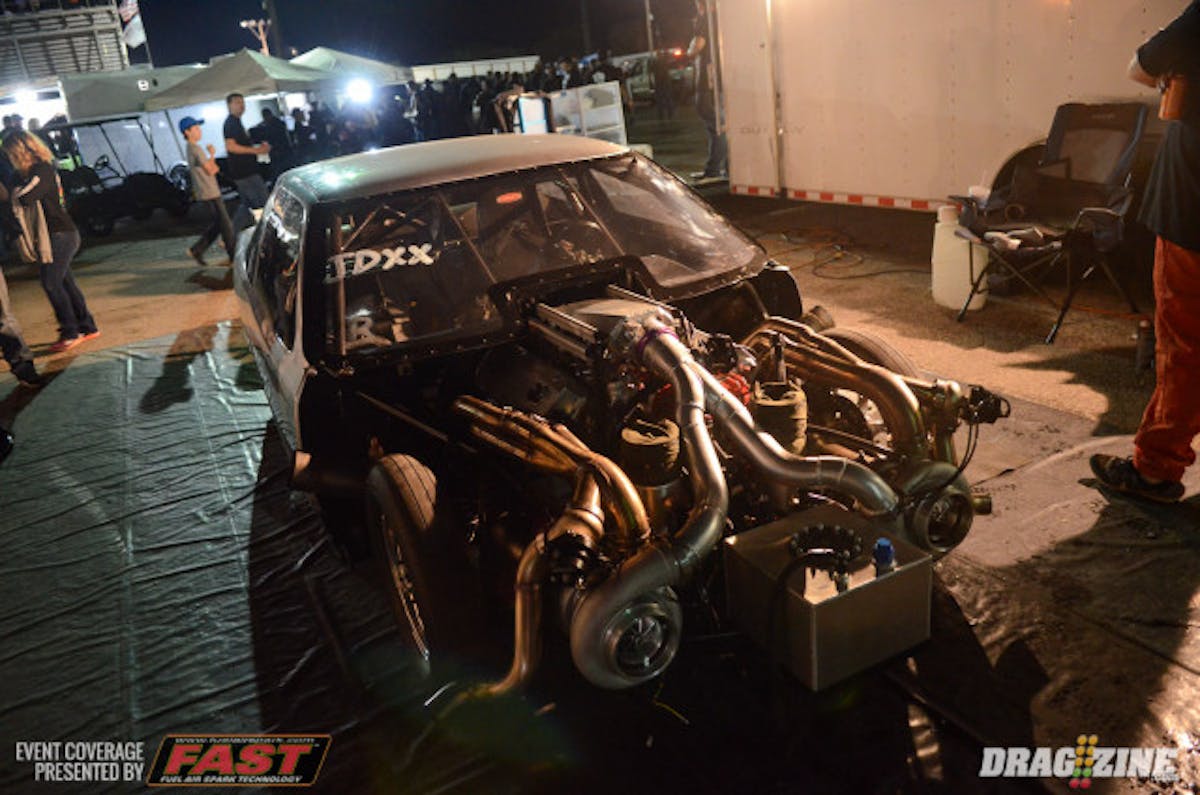 Scott Taylor's 'John Doe' Olds Cutlass, already down a cylinder after burning one up yesterday in testing, burned a piston in the second round and left a little fluid on the race track, ending his night early. 