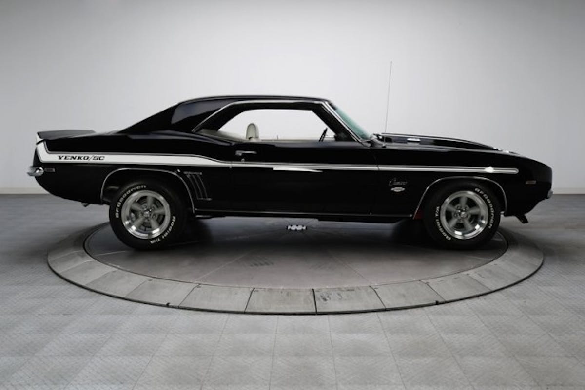 Along with Chevrolet's tweaks to the Camaro's body for 1969, Yenko added a graphics package and a set of American Racing Torq Thurst wheels to kick things up a notch. Image: RK Motors