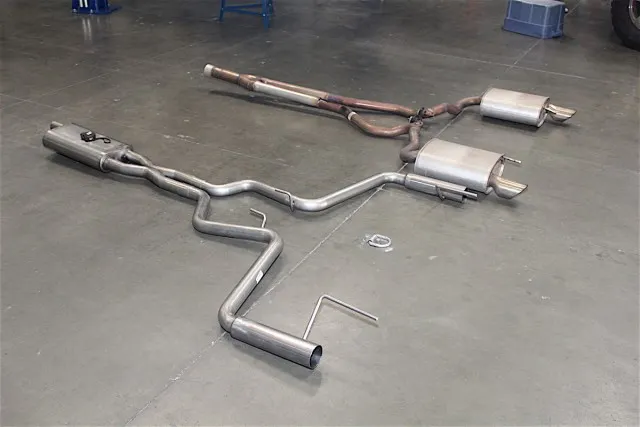 This particular EcoBoost's factory exhaust was modified by removing the factory resonators. The new Gibson exhaust however, weighed a total of 15 pounds less than the modified factory cat-back. It's also important to note that we reused the OEM exhaust hangers for the new Gibson exhaust system.
