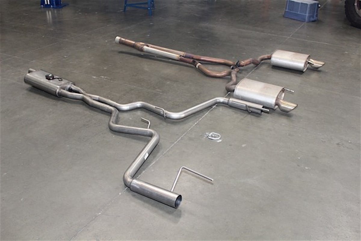 This particular EcoBoost's factory exhaust was modified by removing the factory resonators. The new Gibson exhaust however, weighed a total of 15 pounds less than the modified factory cat-back. It's also important to note that we reused the OEM exhaust hangers for the new Gibson exhaust system.