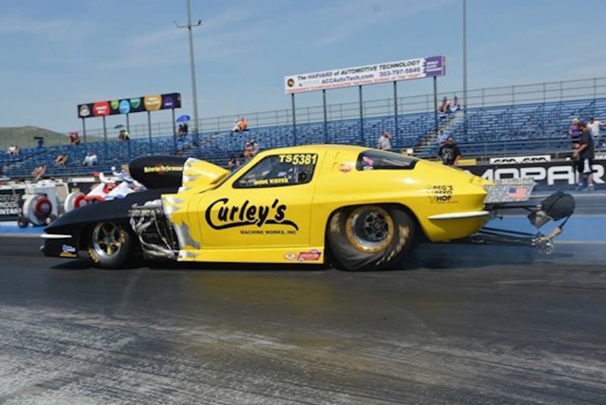 Wade putting some torque to the tires of his 1963 Sportsman Chevy Corvette.