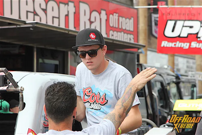 Brett signing autographs during contingency.