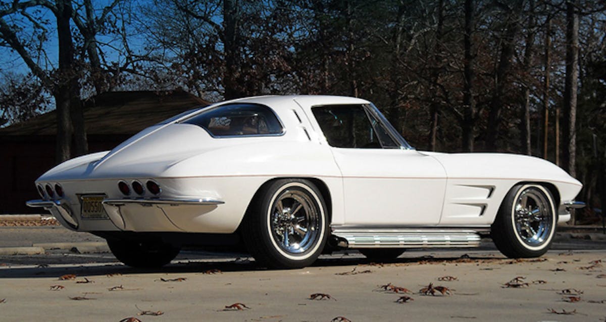 This is the classic “shaved” look from the mid-’60s. Settrella’s ‘63 Coupe is sans door handles, windshield wipers, gas cap, and all factory badges. The car was lowered 2-inches and Settrella used some subtle graphics tricks.
