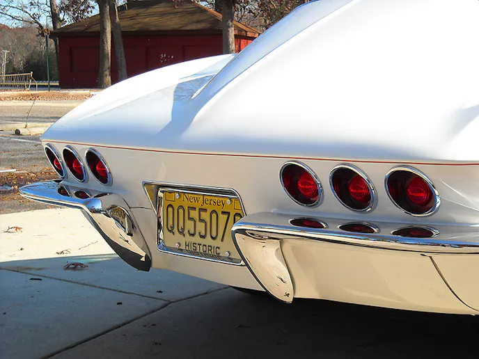 If two sets of three taillights were good enough for the Impala and Caprice - why not the Corvette? Take note of what Settrella did with the pinstriping. Rather than placing the 1/8-inch stripe precisely above or below the horizontal body crease, the stripe is 1/4-inch below the body crease. The eye is drawn to the lower-placed pinstripe, making the car appear somewhat lower than it really is. These graphic artists can be tricky!