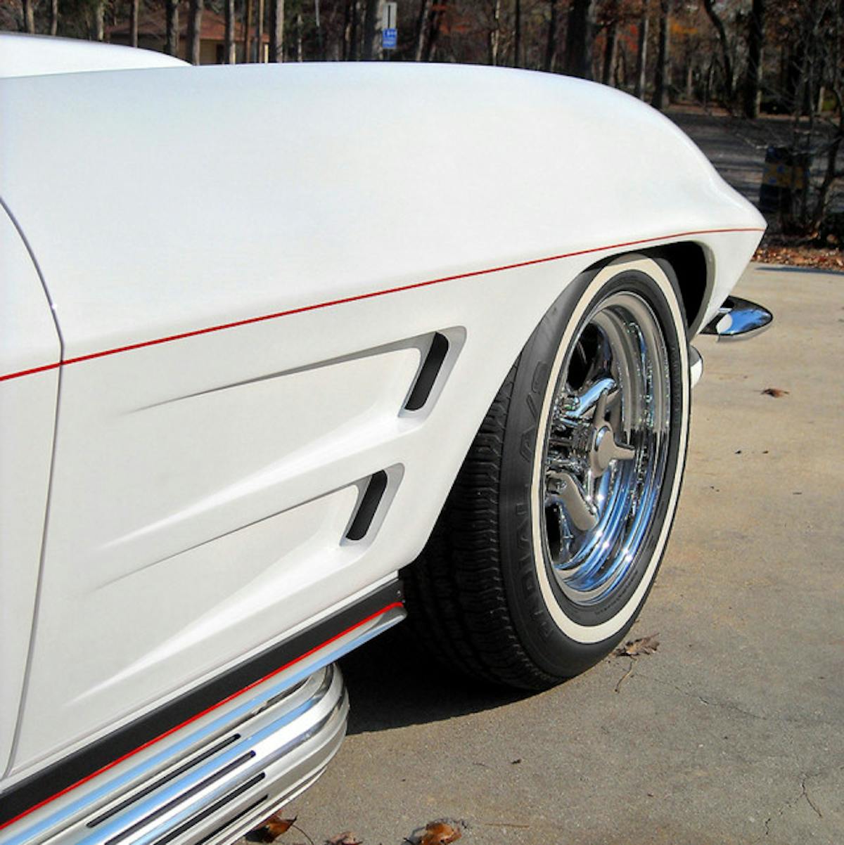 Factory side pipes weren’t available until 1965, but the Corvette community doesn’t mind seeing them on all mid-year Vettes. Cherry Bomb glasspack mufflers reside under the covers.