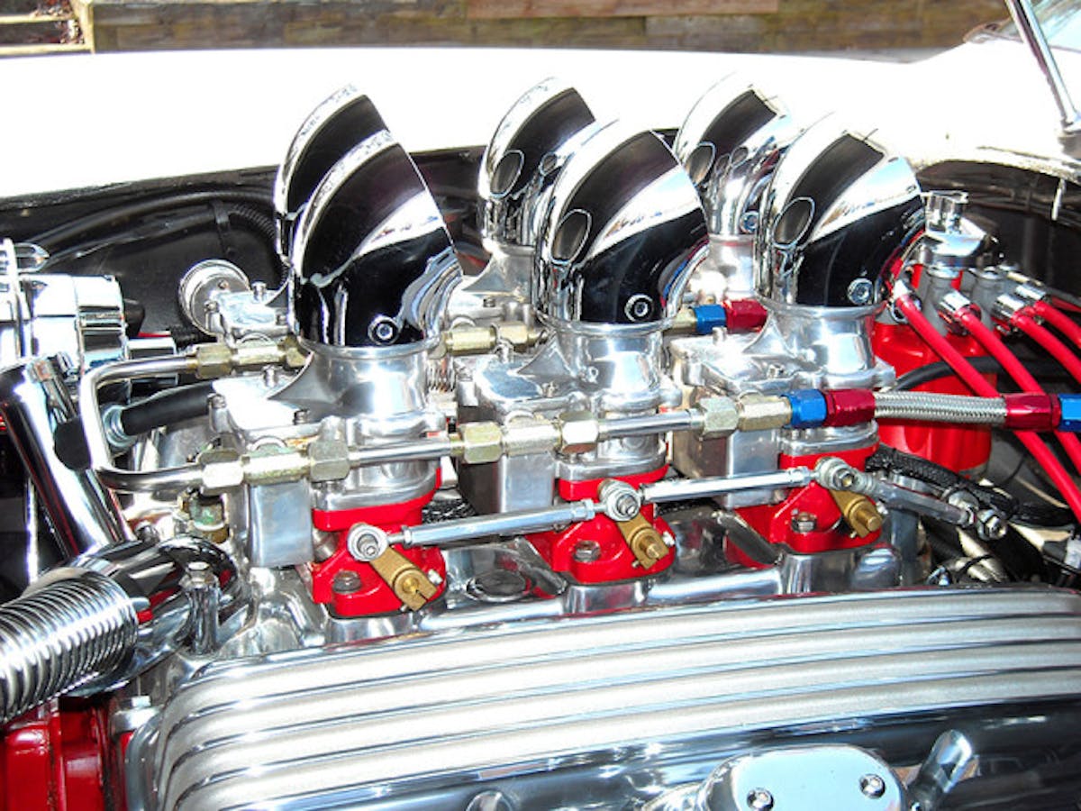 What looks like a six Stromburg carbs setup is actually a computer-controlled electronic fuel-injection system. It’s a beautiful blend of modern electronics with classic looks.