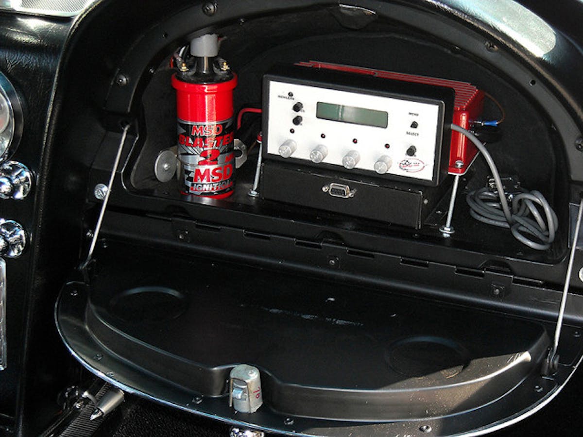 Sorry, no room for gloves! The MDS Ignition Box, Blaster Coil, and electronic fuel-injection module computer all live in the glove box. Settrella and his son, Jonathan Jr. dialed in the car on the rural back roads of Southern New Jersey farmland.