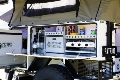 The trailer has a full stainless steel kitchen.