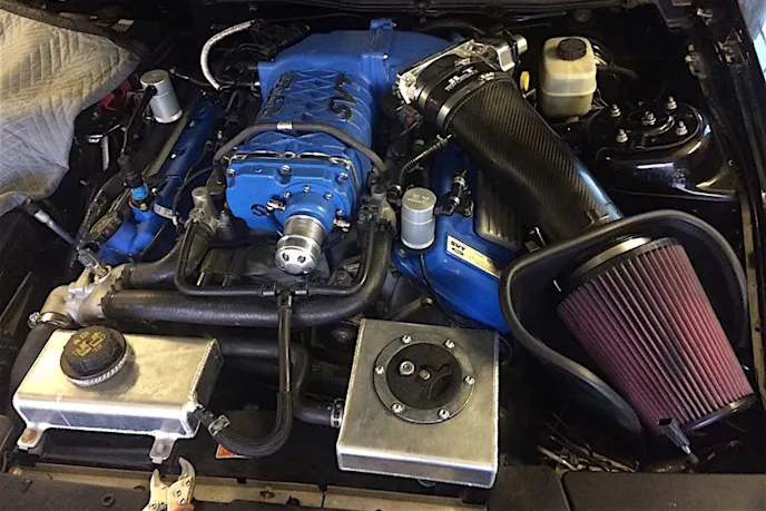 The final iteration sports a powder-coated and ported OEM 2.3 TVS supercharger and a JLT carbon fiber cold-air intake. The combination's results? 660 horsepower at the rear-wheels.