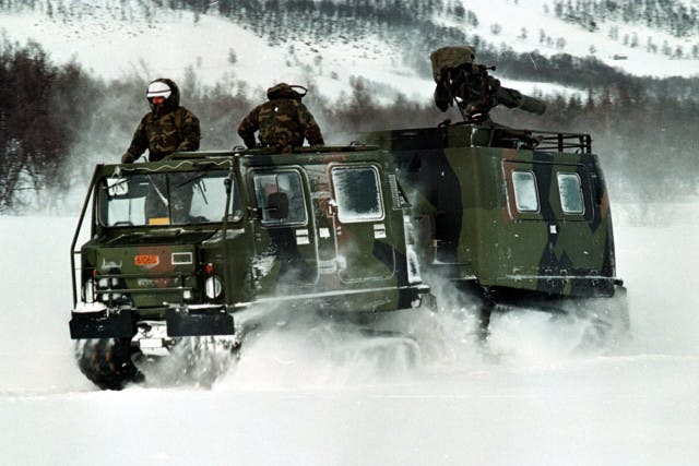 Reservists with TOW Platoon, Headquarters Company, 25th Marines, maneuver the BV-206 all-terrain carrier through the snow near Aesegarden, Norway.  The Marines from Chicopee, Mass., are deployed here for Exercise Strong Resolve.
