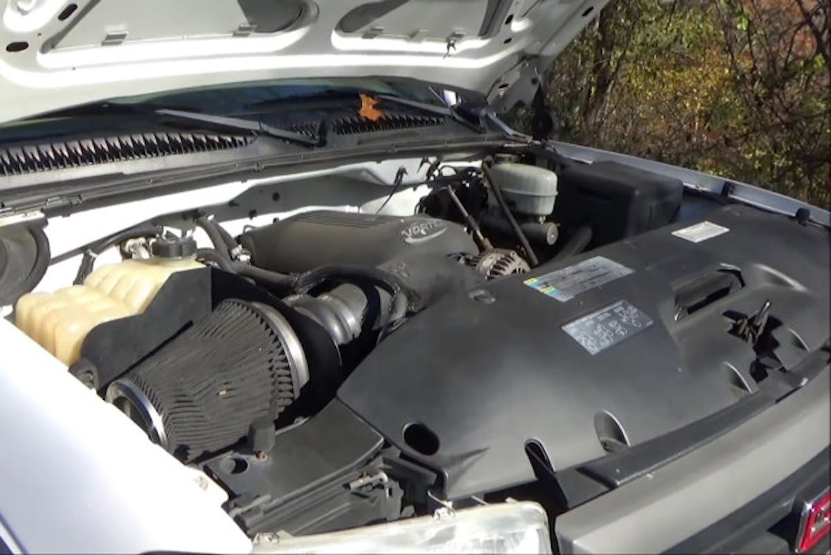 The GMC has a bone stock 6.0 LS.