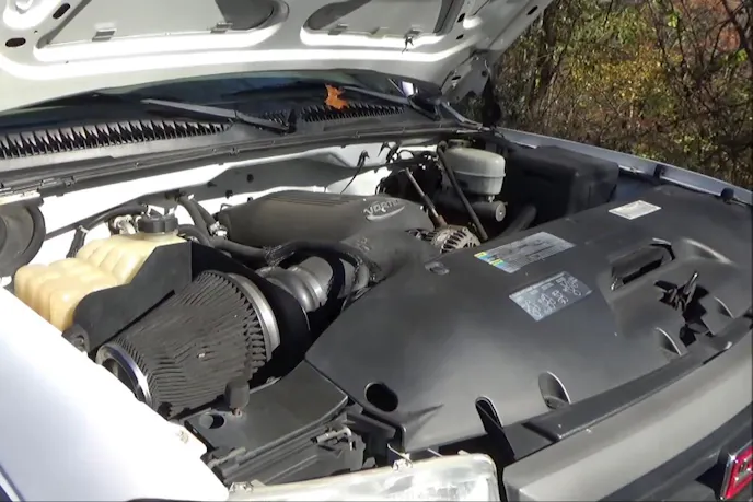 The GMC has a bone stock 6.0 LS.