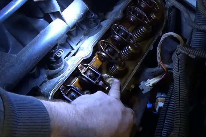 Craig says that if this area under the valve covers on high mileage engines is this color, the rings should be in good shape and you can go with the motor.