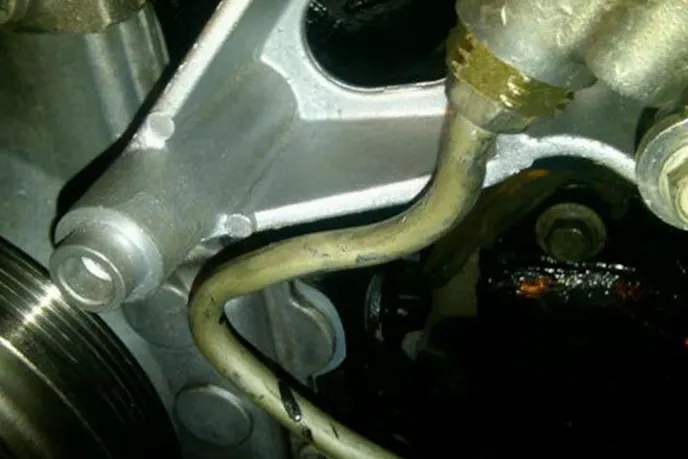 You can see the gouges on the hi-side line Rafael made while adjusting it to fit properly.